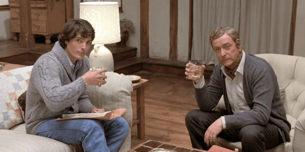 Michael Caine and Christopher Reeve’s Forgotten Twisty ‘Who’ll-Do-It’ Black Comedy Is The Perfect Watch For ‘Knives Out’ Fans